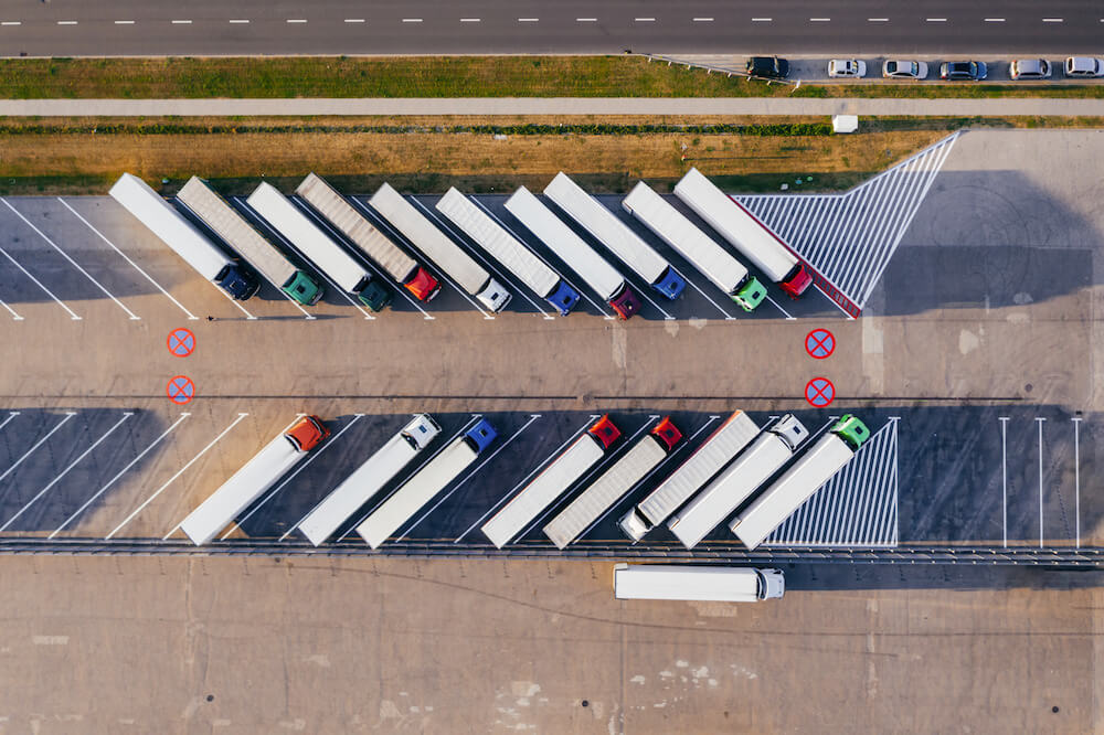 trucksparkedbesidehighway | Limepack trucks parked beside highway